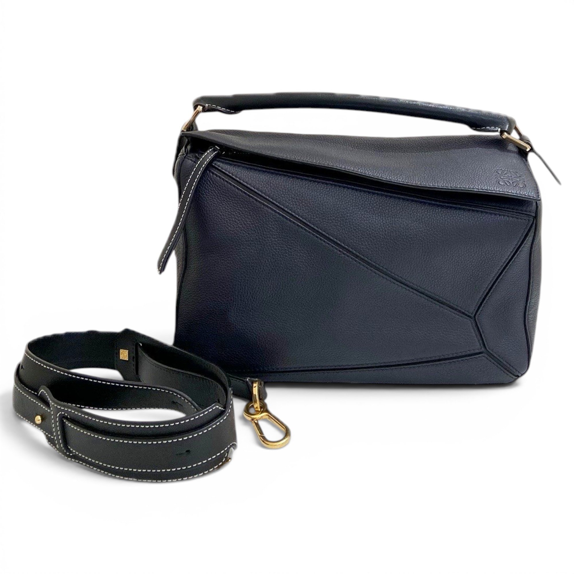 Puzzle leather handbag