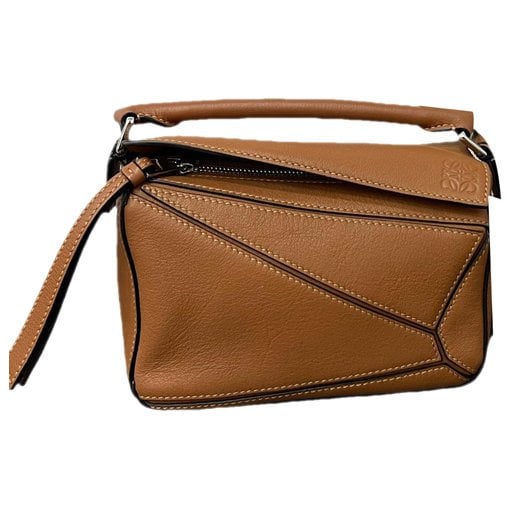 Puzzle leather handbag