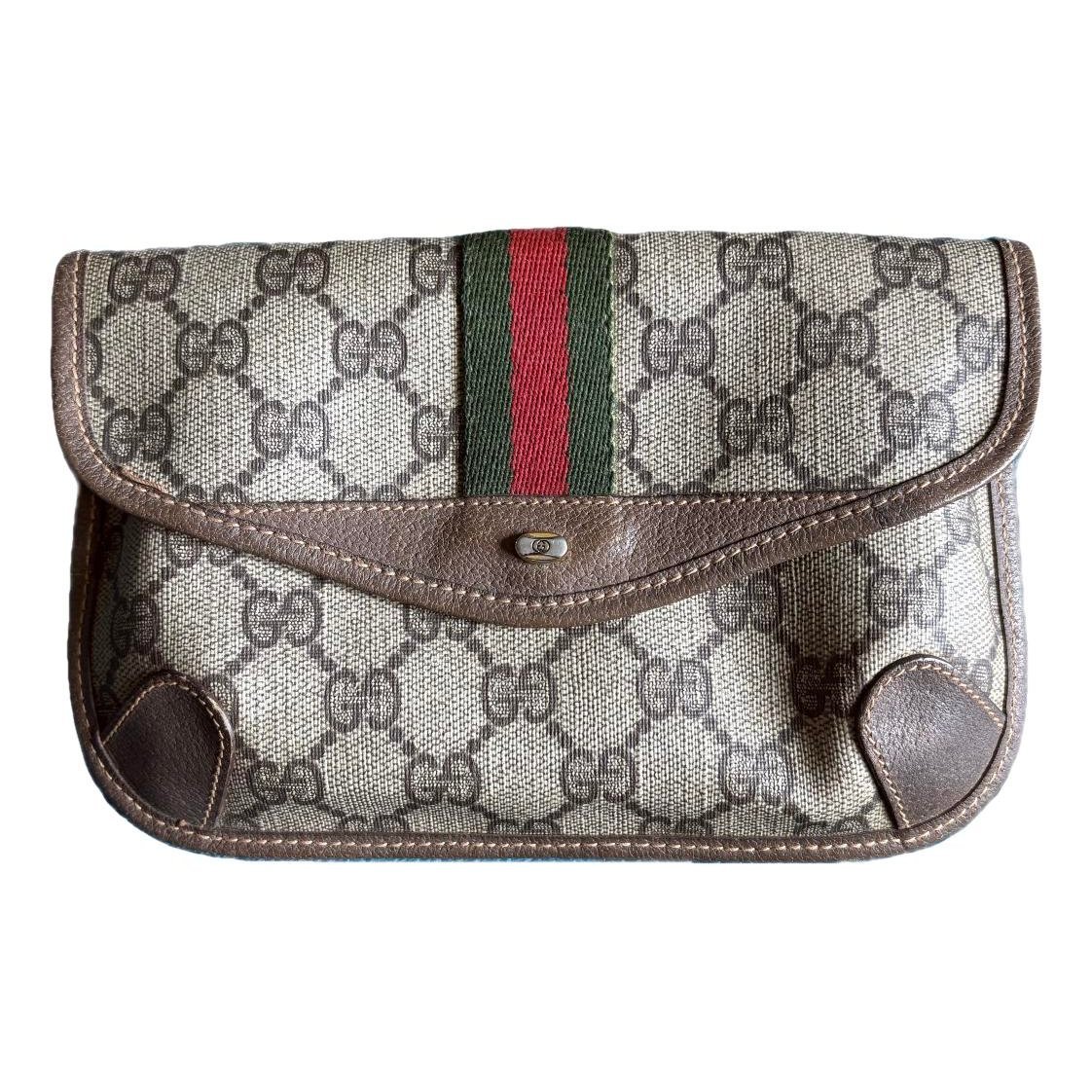 Ophidia cloth clutch bag