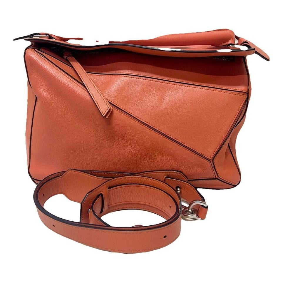 Puzzle leather handbag