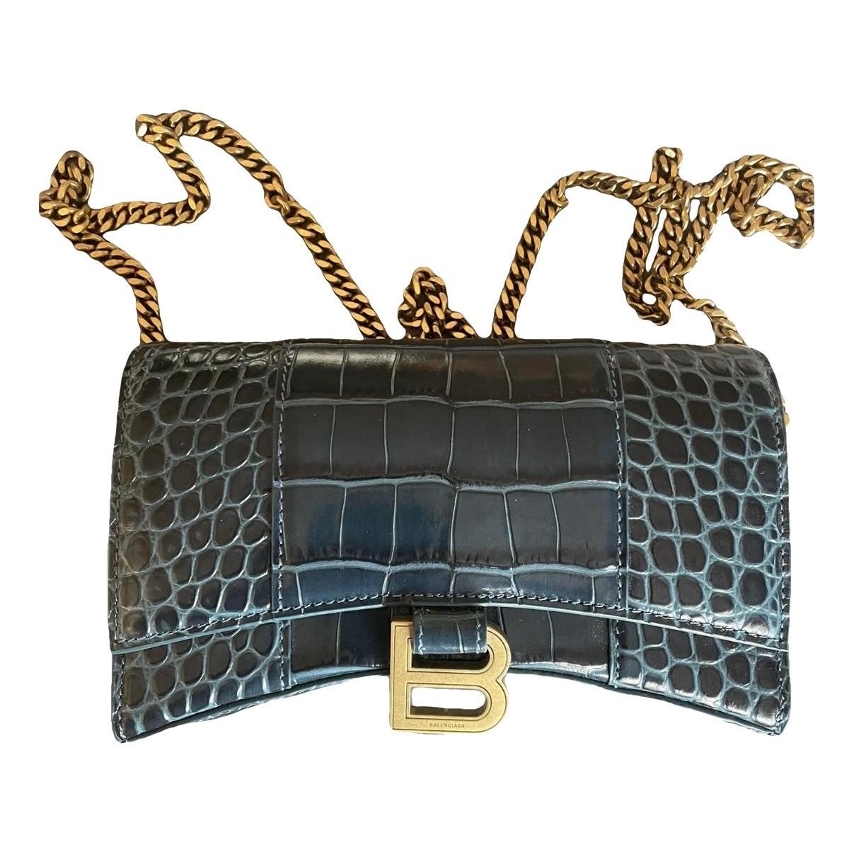 Hourglass leather handbag