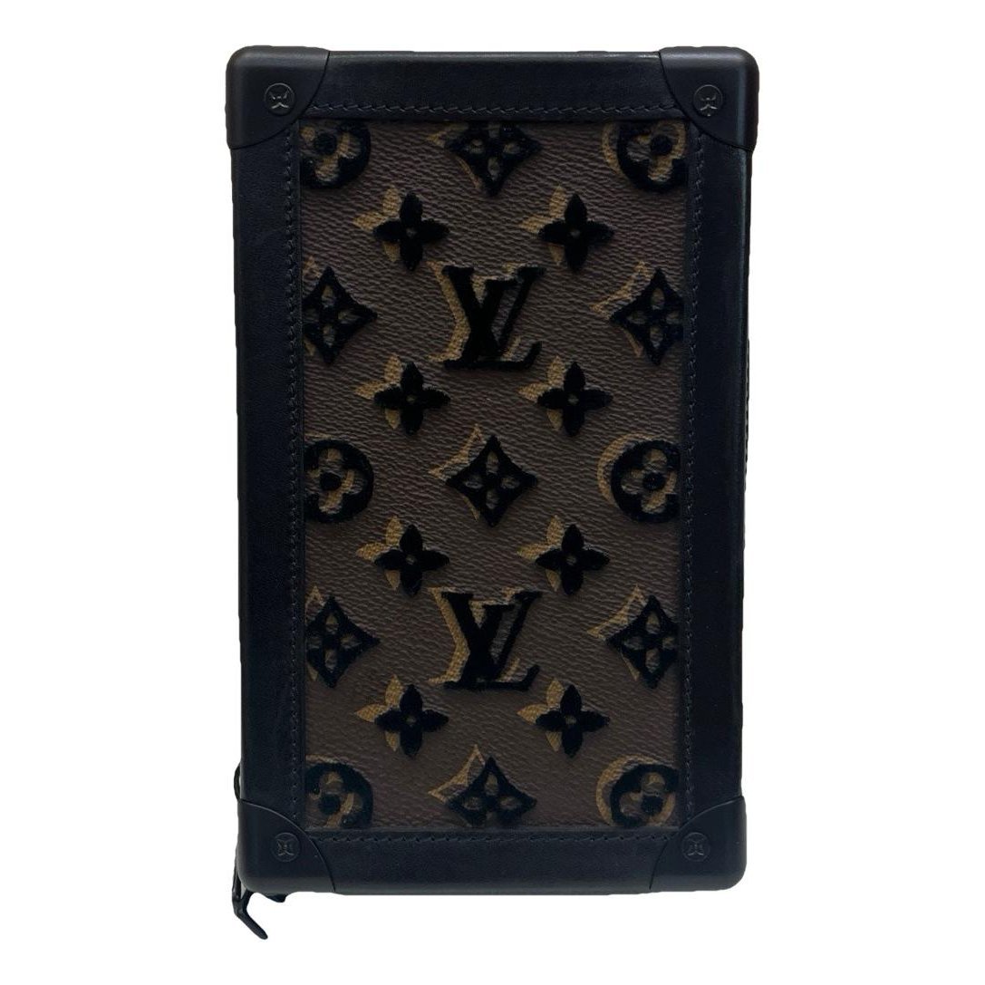 Pochette Trunk Verticale vinyl crossbody bag