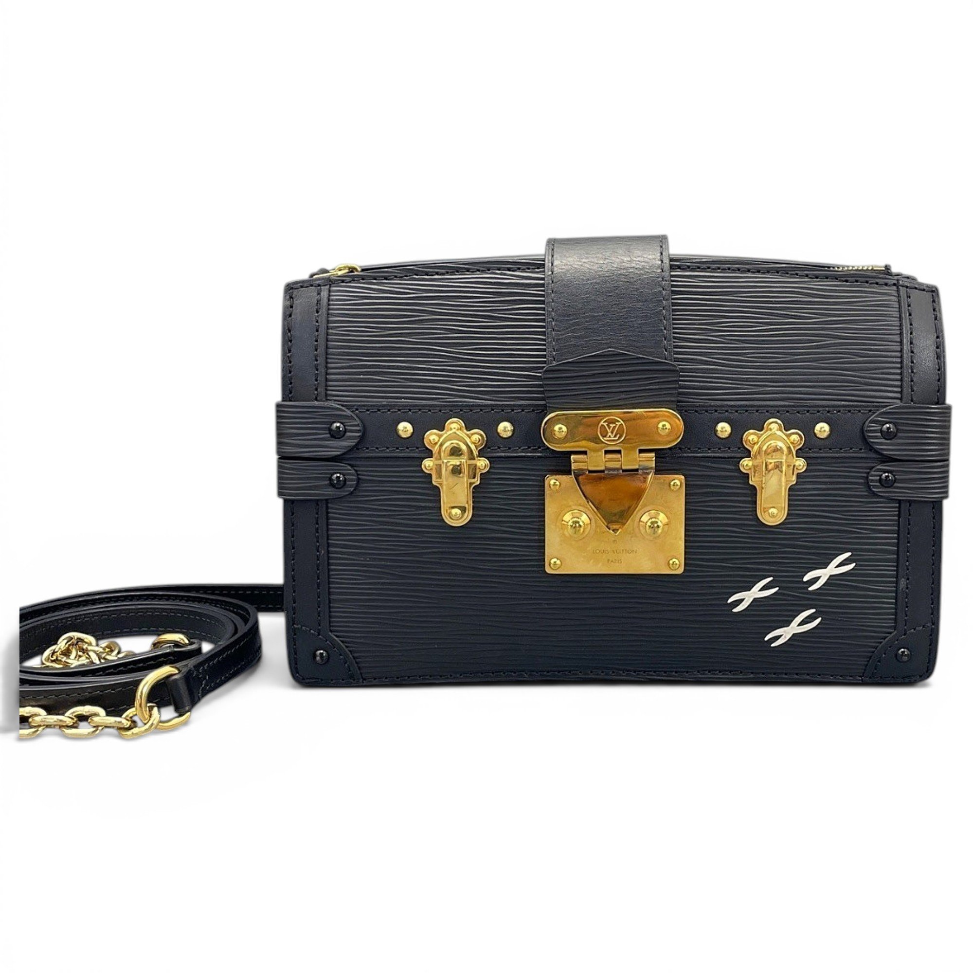 Pochette Trunk leather handbag