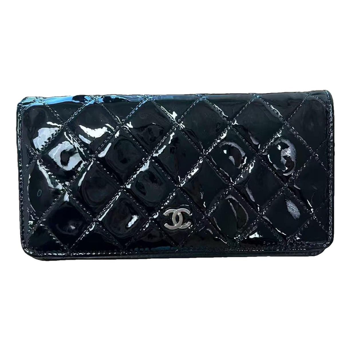 Patent leather clutch bag