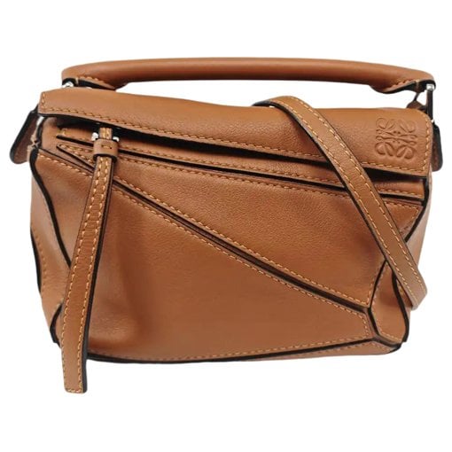 Puzzle leather handbag