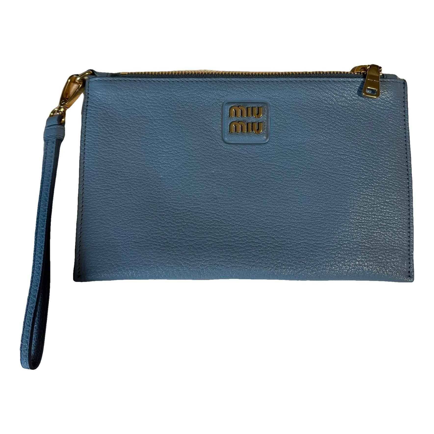 Madras leather clutch bag