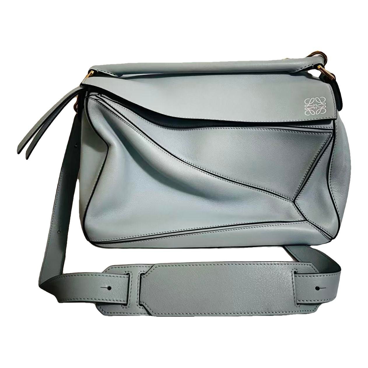 Puzzle leather handbag
