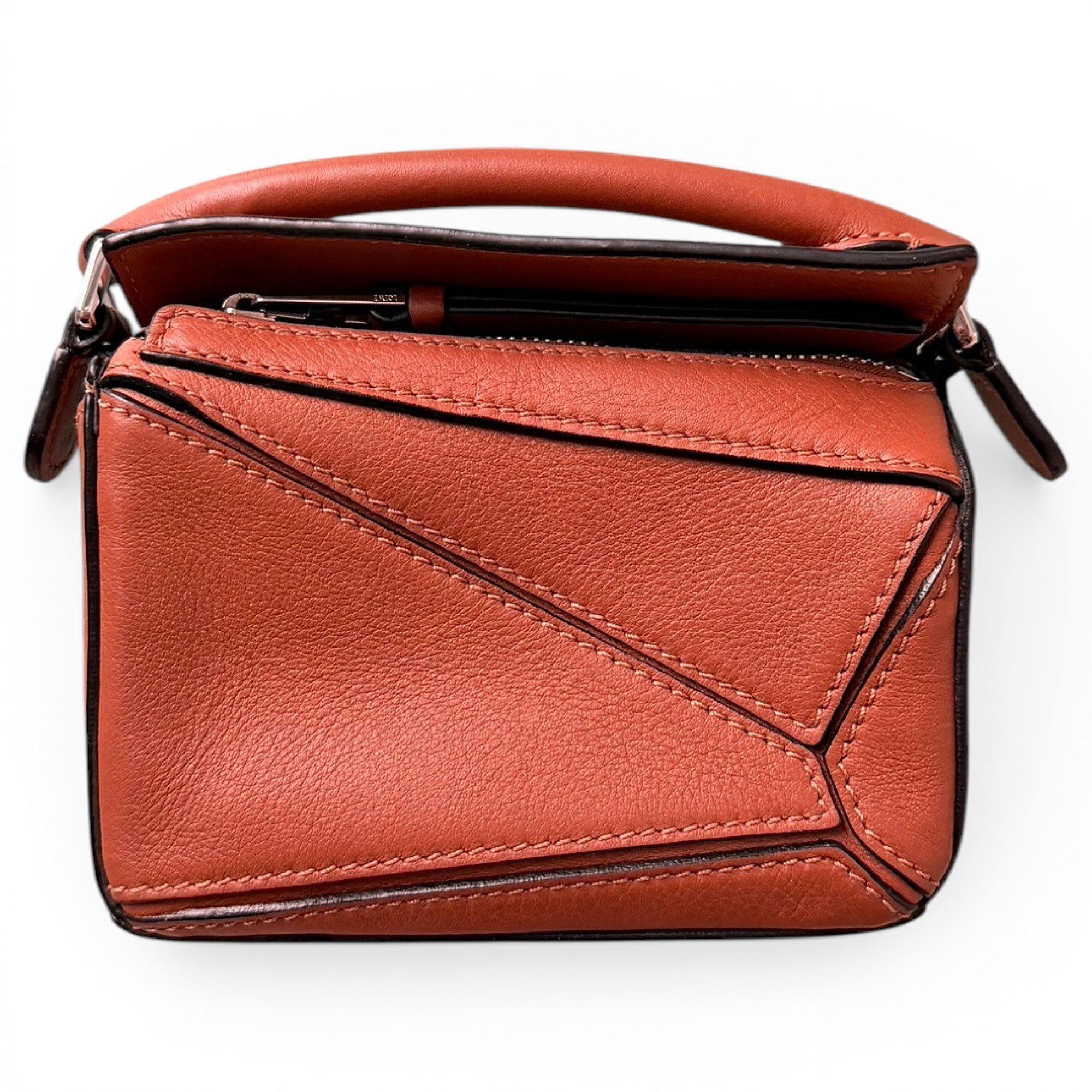 Puzzle leather handbag