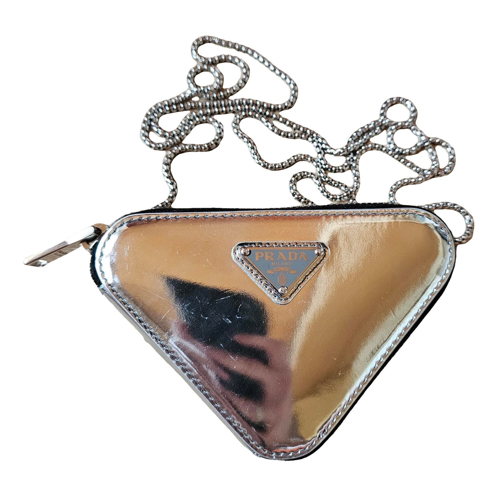 Triangle leather clutch bag