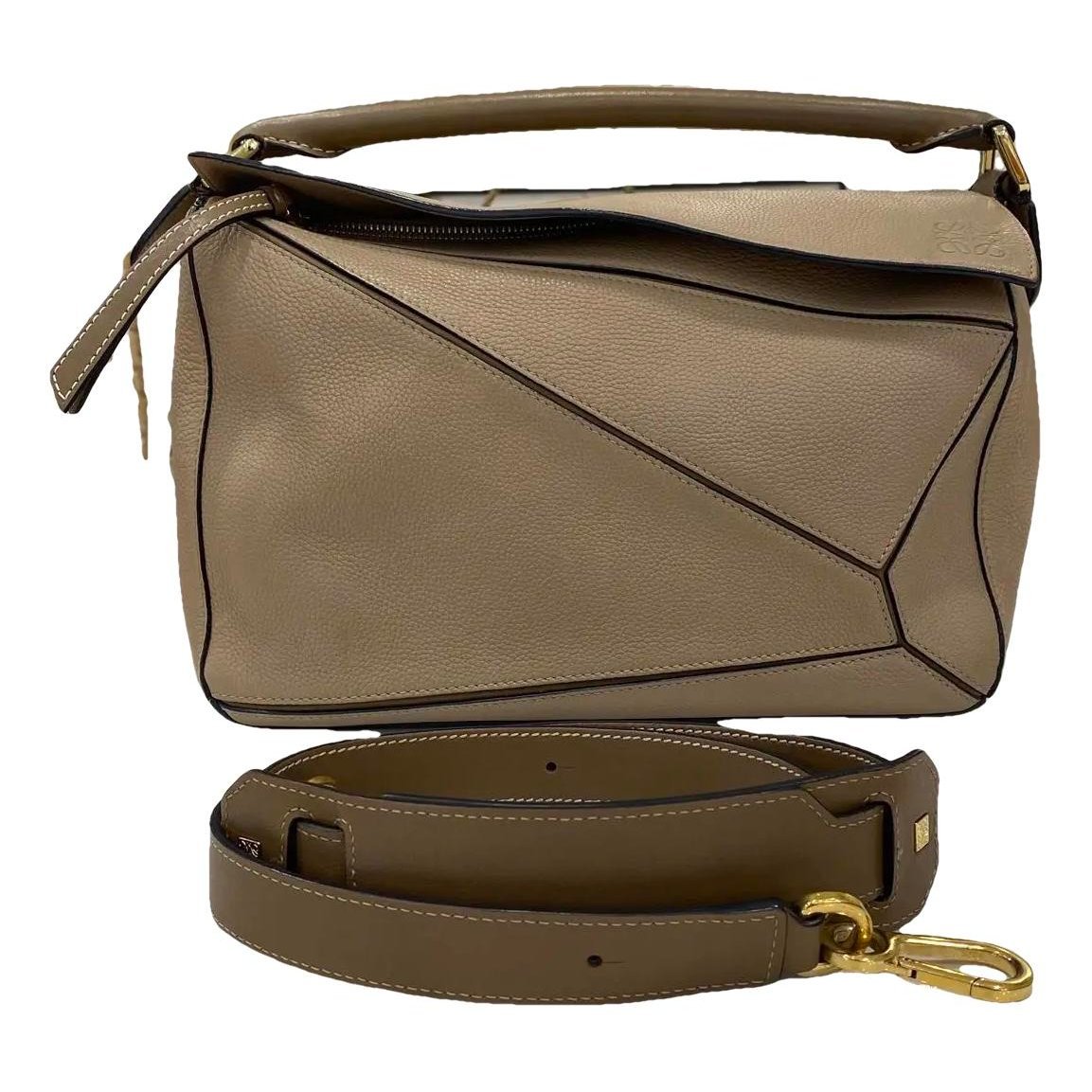 Puzzle leather handbag