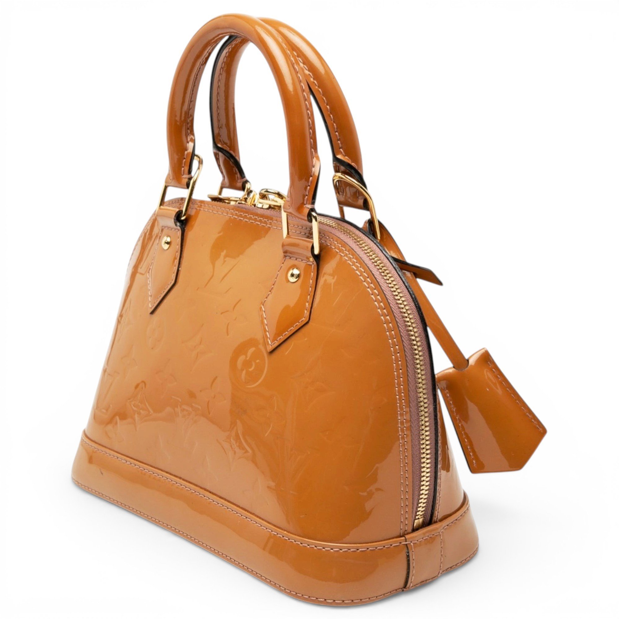 Louis Vuitton Alma patent leather handbag