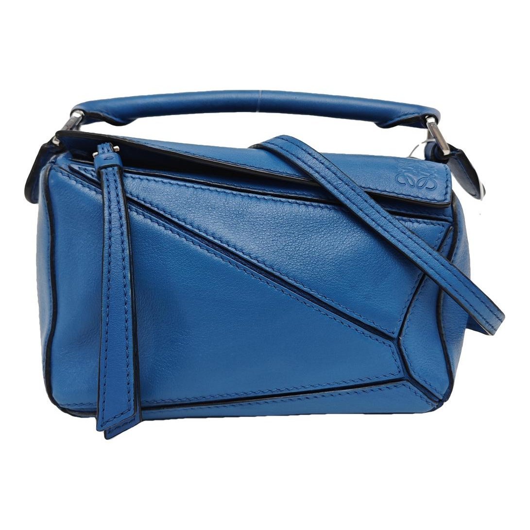 Puzzle leather handbag