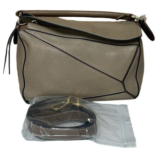 Puzzle leather handbag