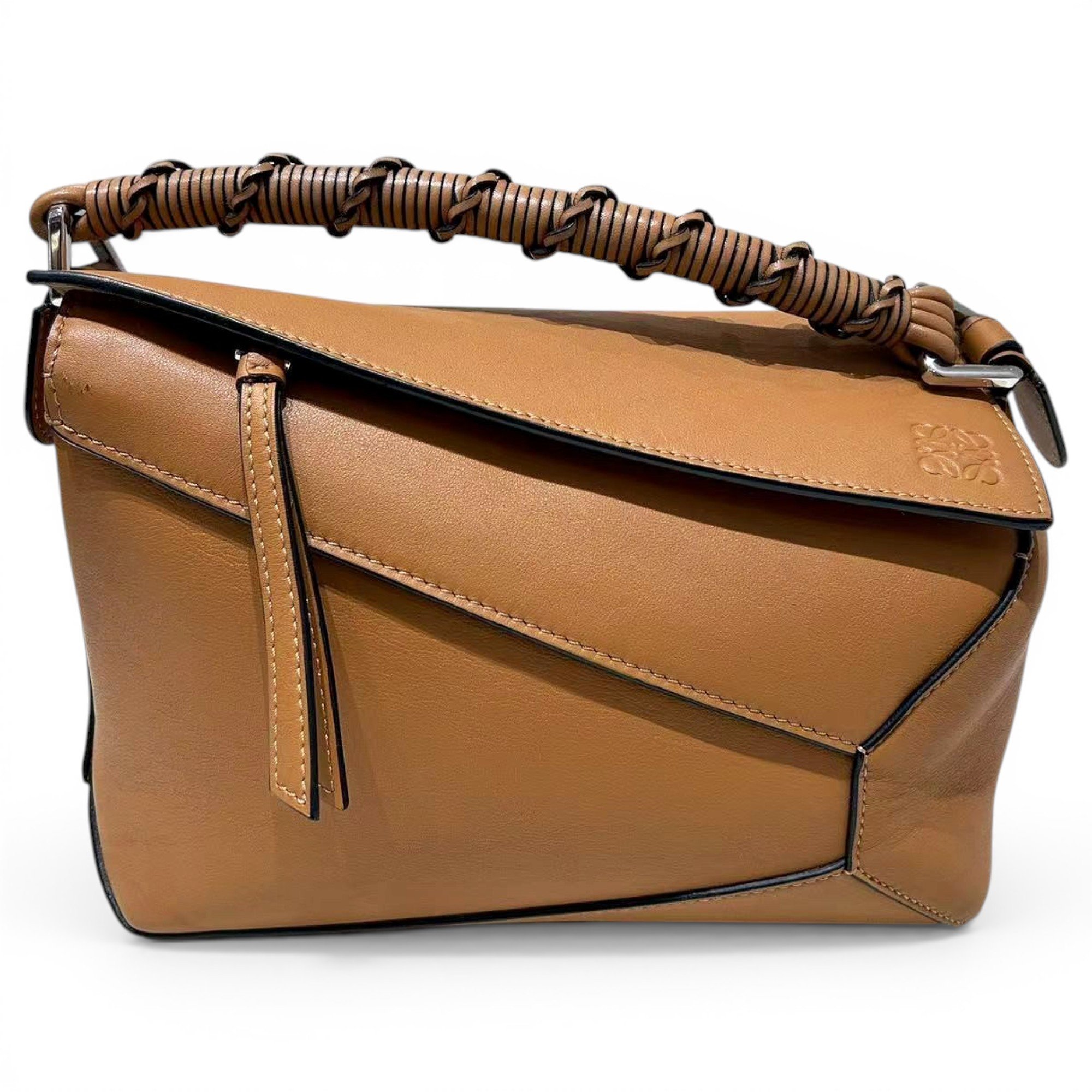 Puzzle leather handbag