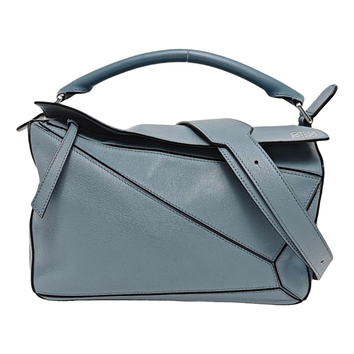 Puzzle leather handbag
