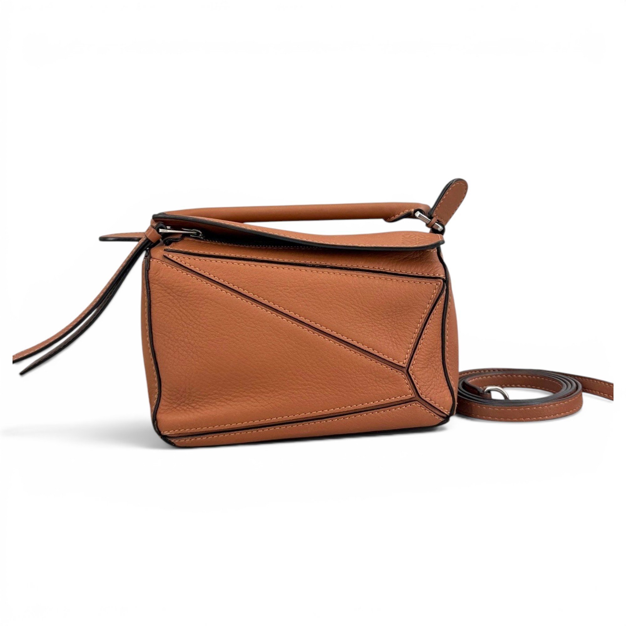 Puzzle leather handbag