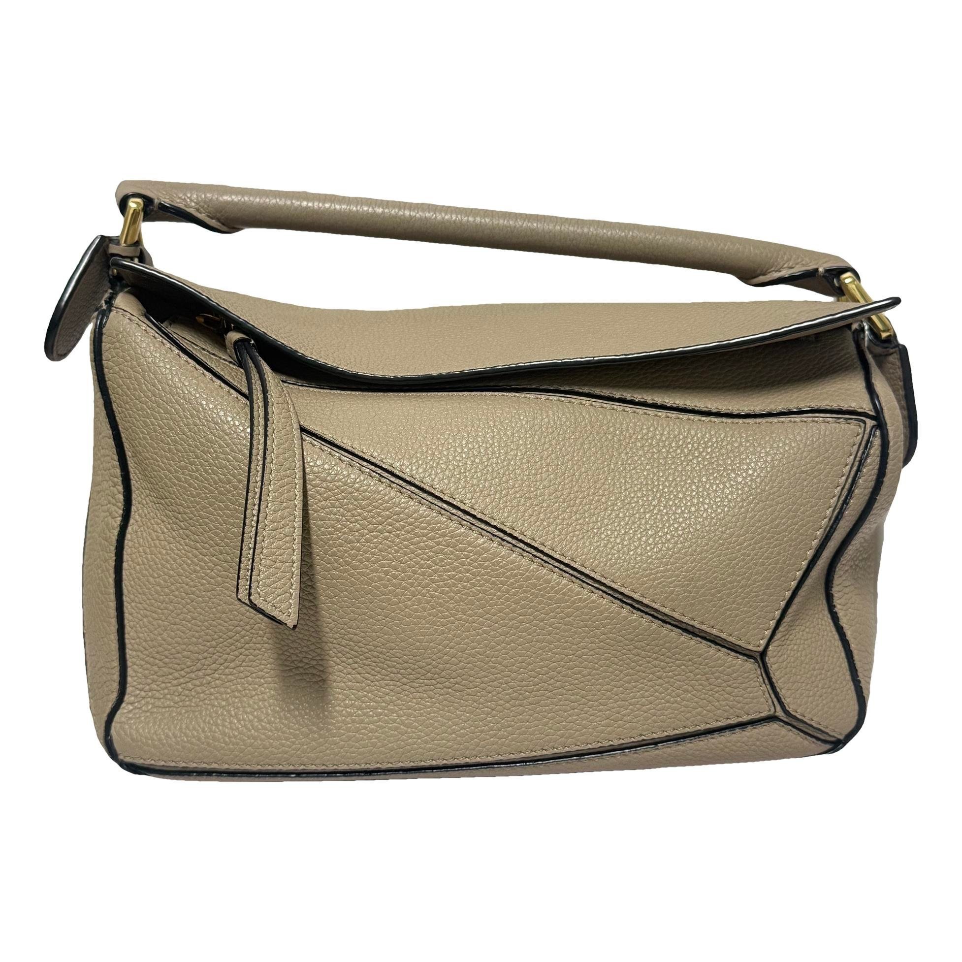 Puzzle leather handbag