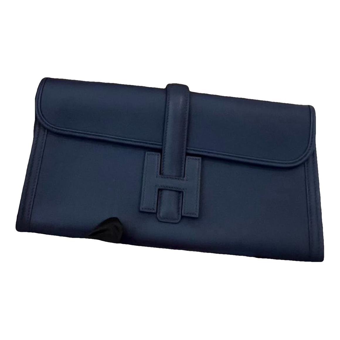 Jige leather clutch bag