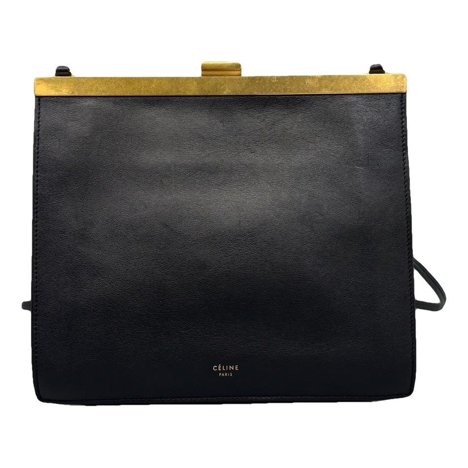 Clasp leather handbag