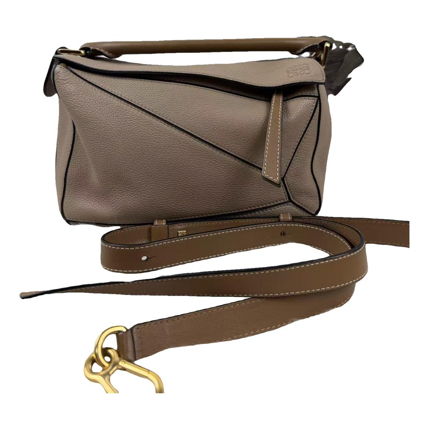 Puzzle leather handbag