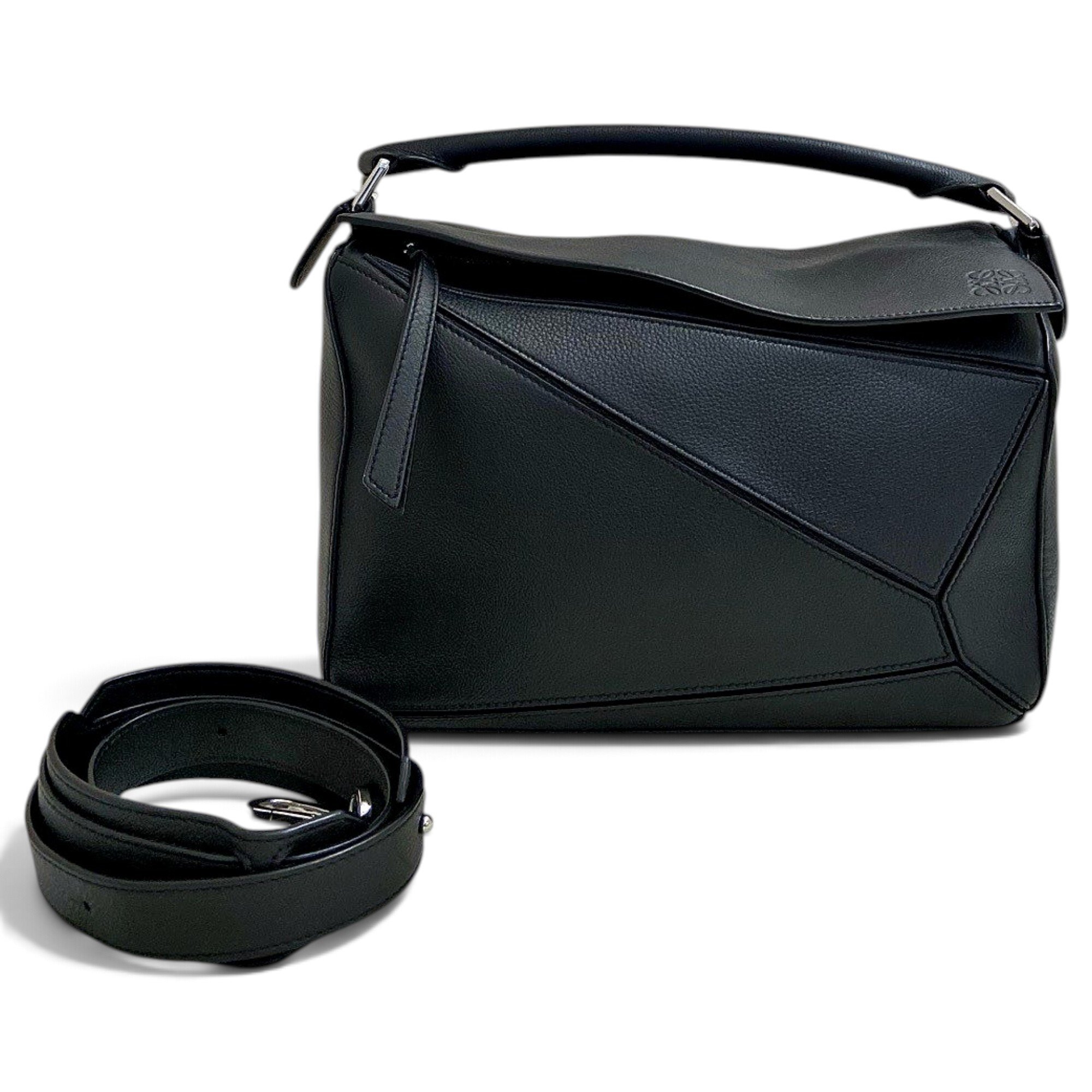 Puzzle leather handbag