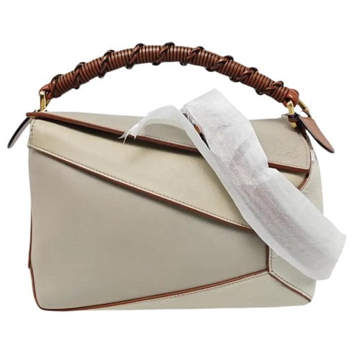 Puzzle leather handbag