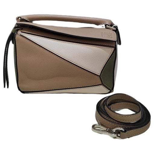 Puzzle leather crossbody bag