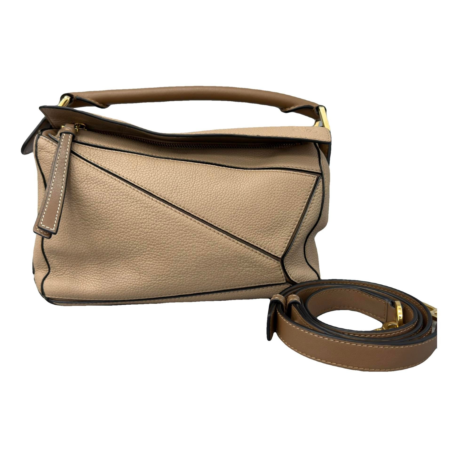 Puzzle leather handbag