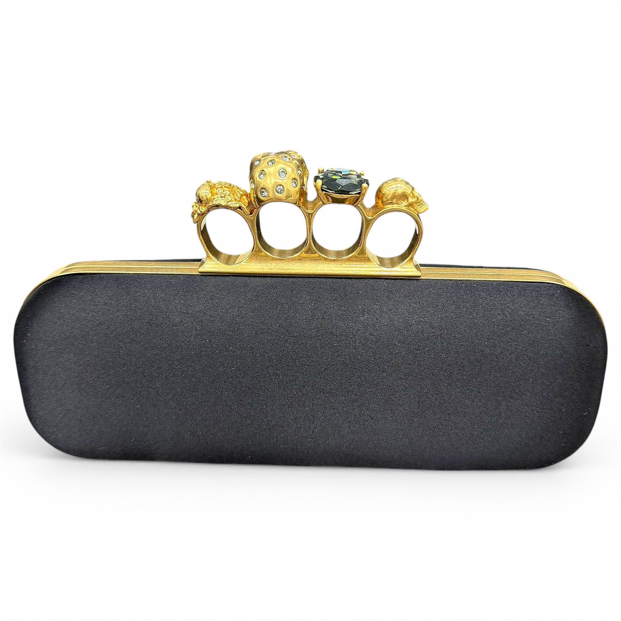 Knuckle clutch bag