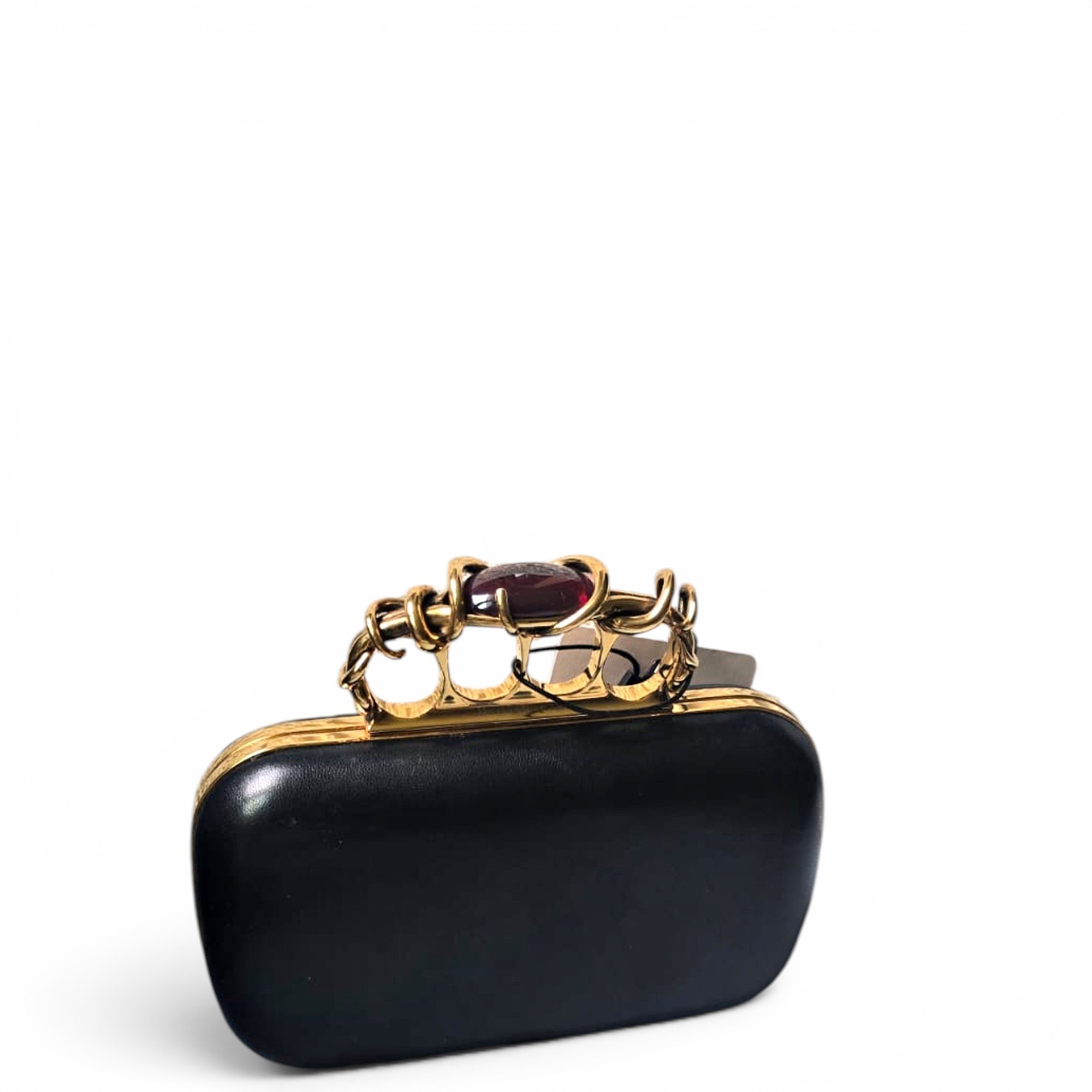 Knuckle leather clutch bag