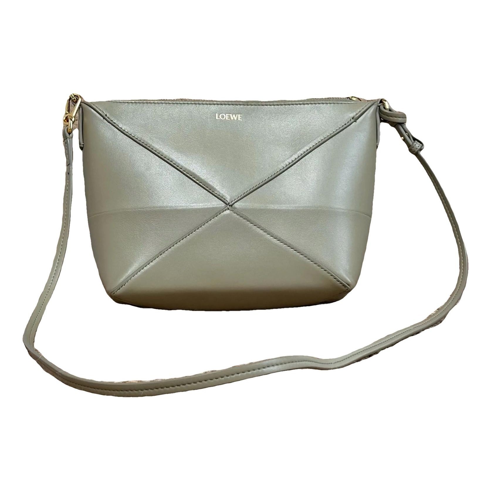 Puzzle Fold Pouch leather handbag