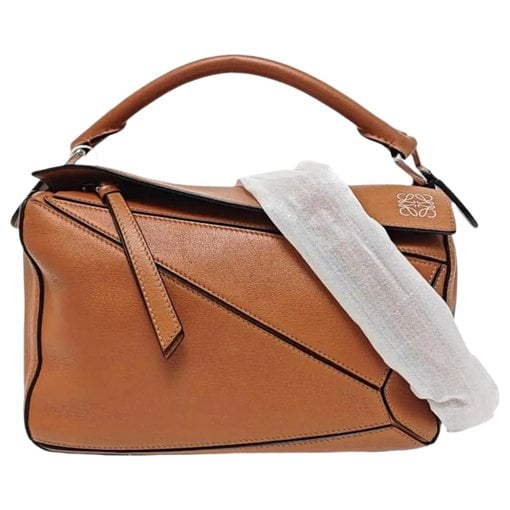Puzzle leather handbag
