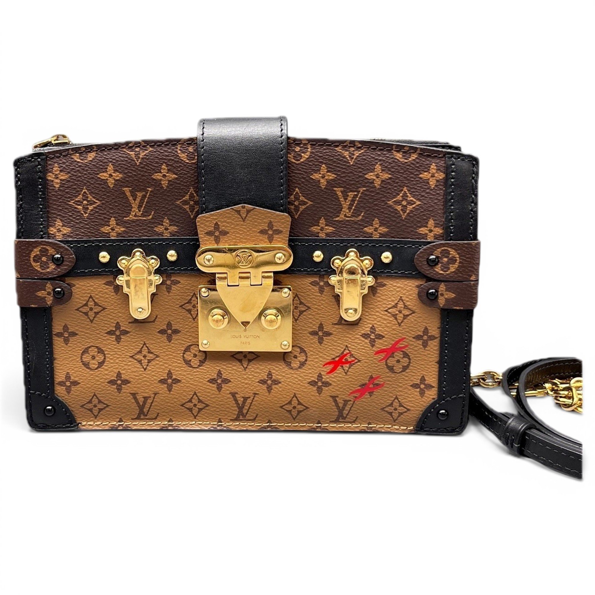 Pochette Trunk leather handbag