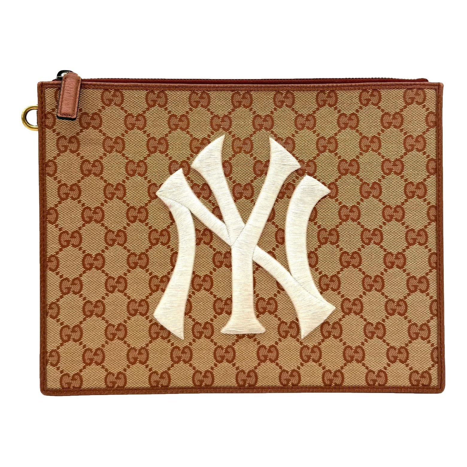 Ophidia leather clutch bag