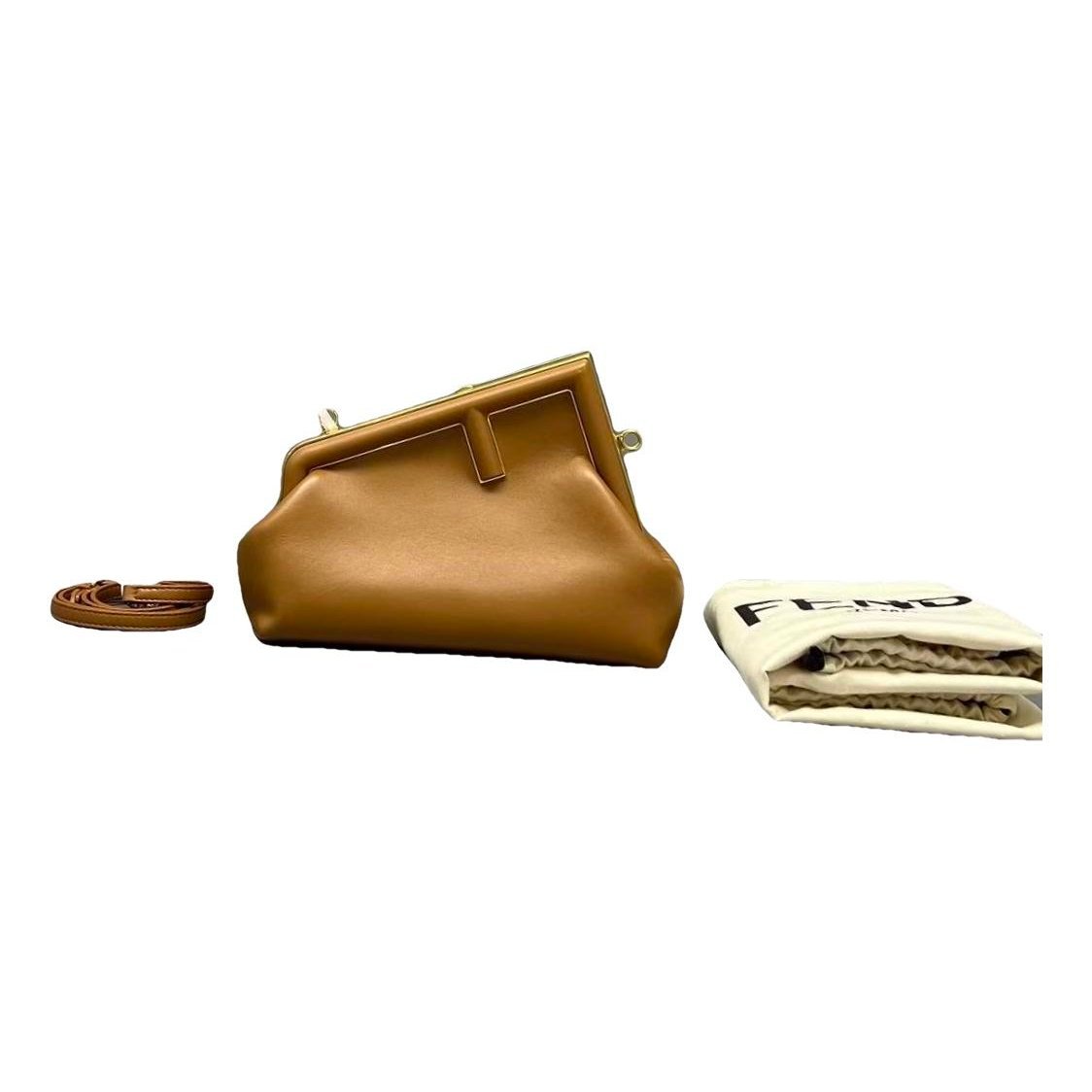 First leather handbag