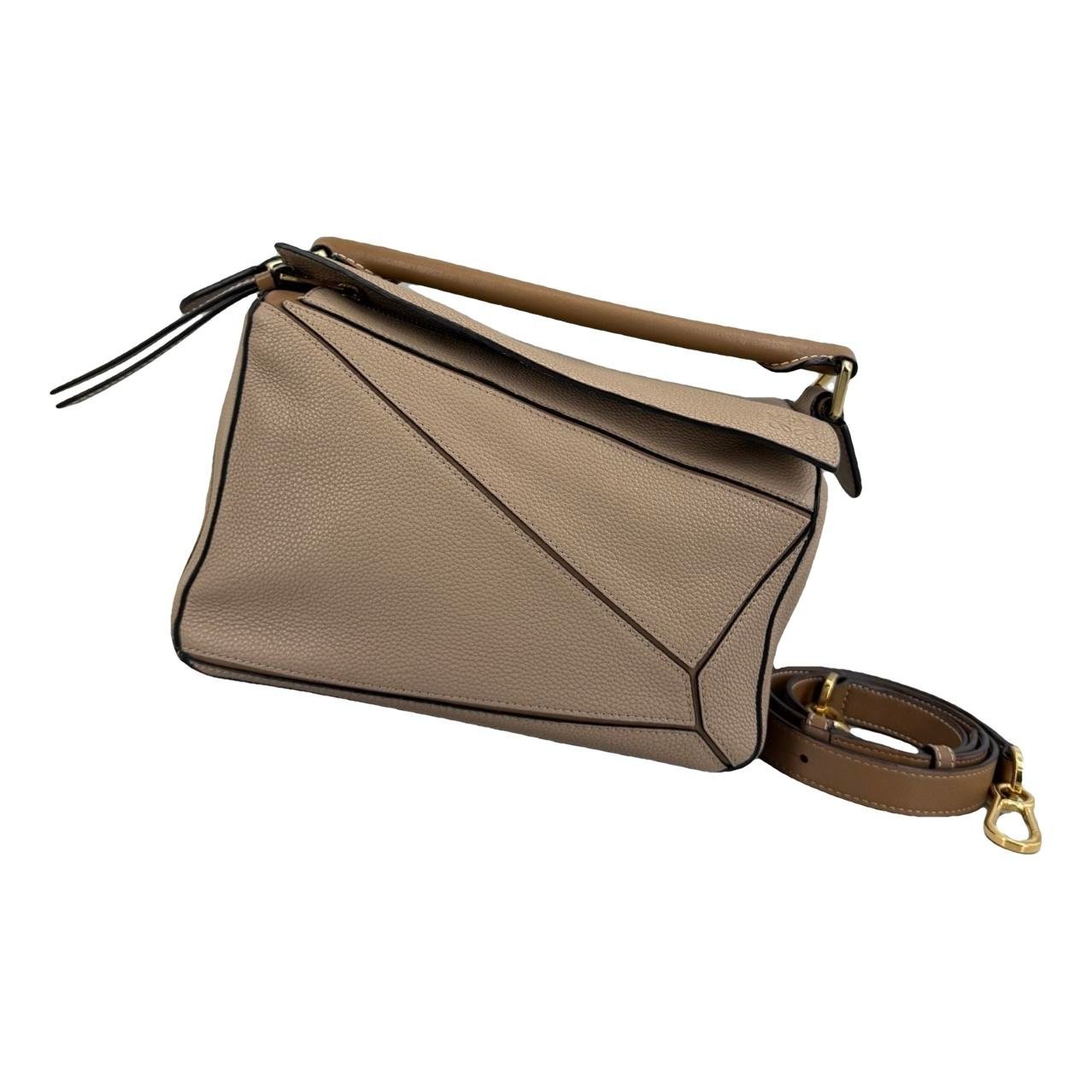 Puzzle leather handbag