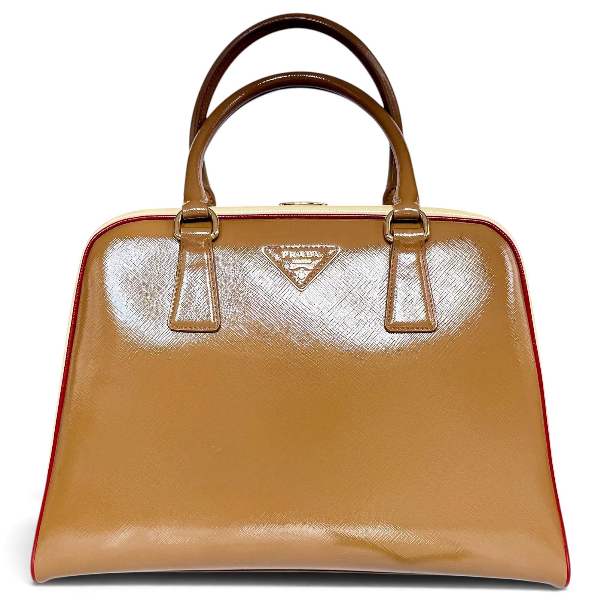 Pyramid patent leather handbag