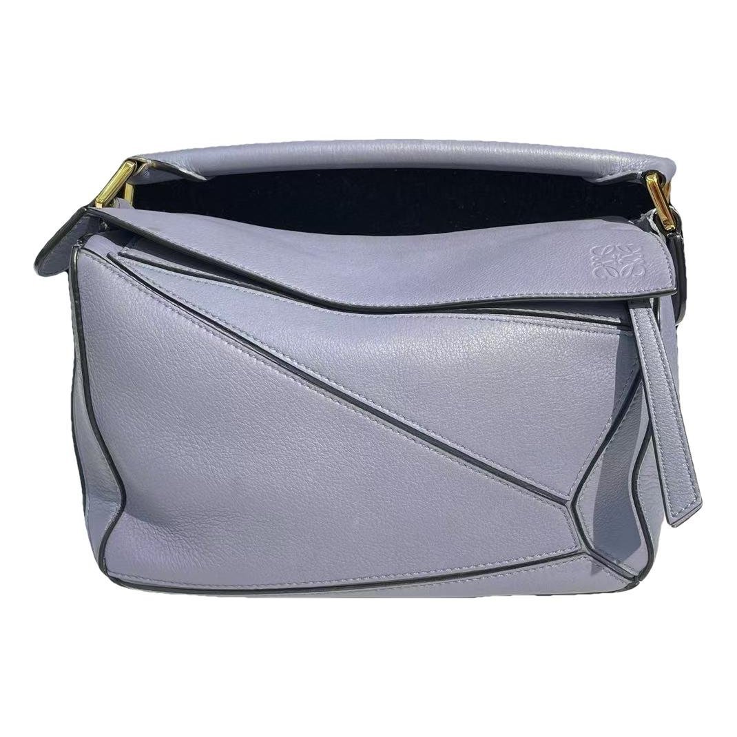 Puzzle leather handbag