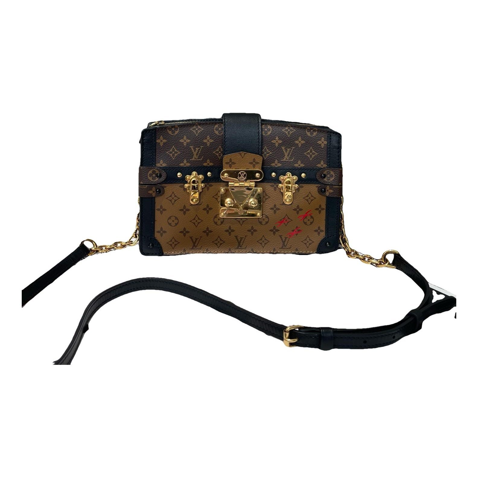 Pochette Trunk leather handbag