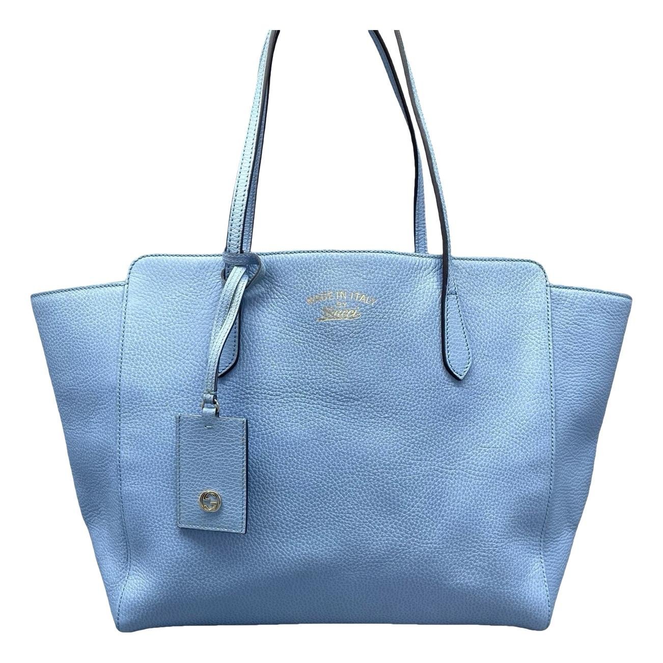 Swing leather handbag