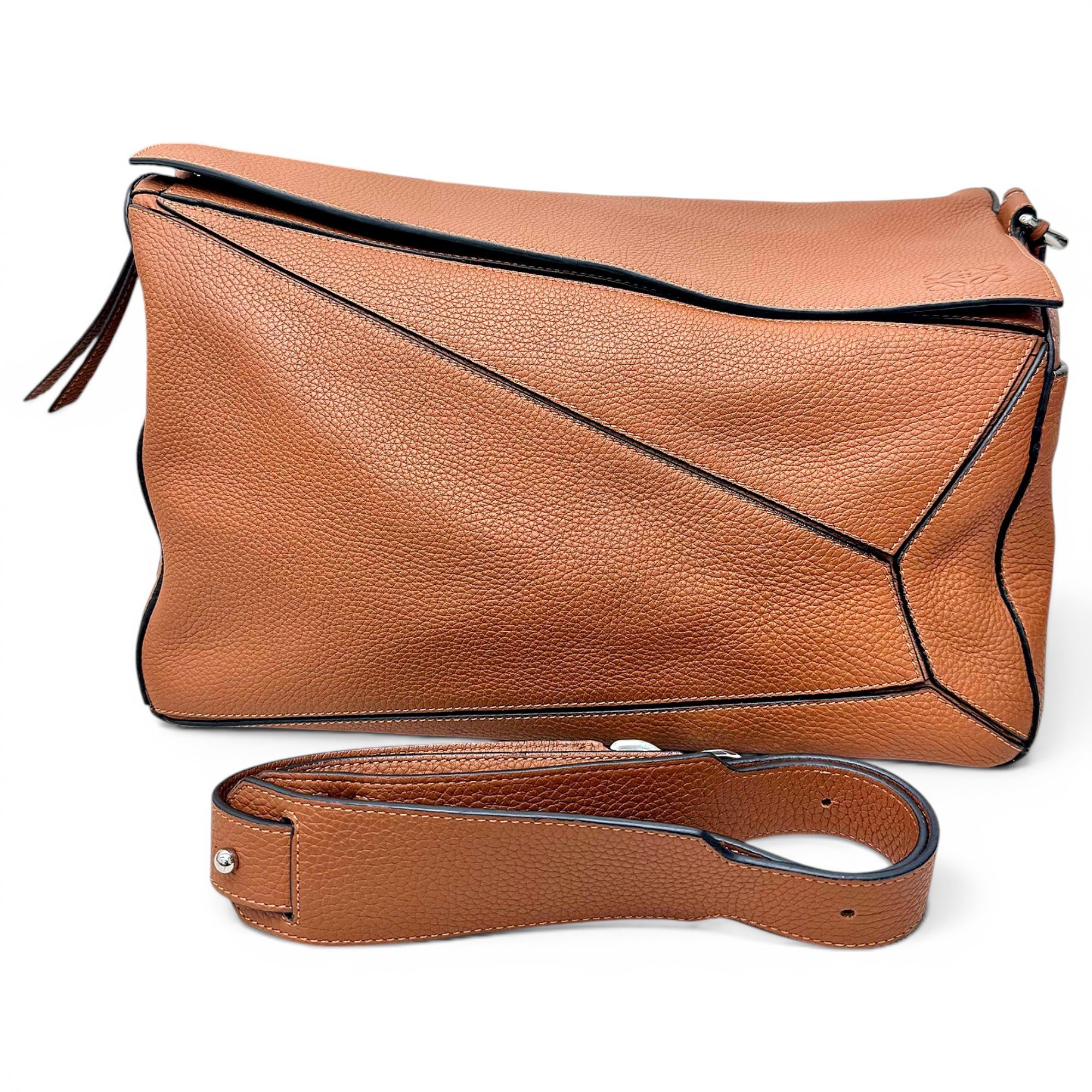 Puzzle leather handbag