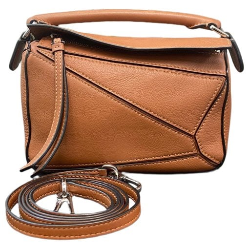Puzzle leather handbag