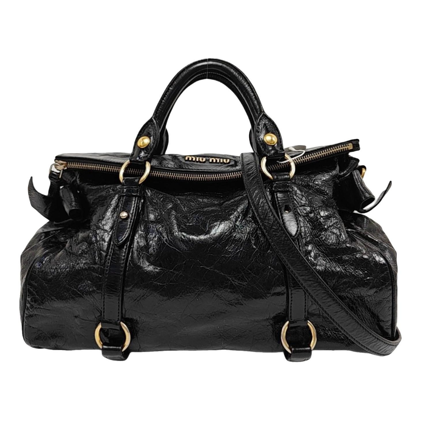 Bow bag leather handbag