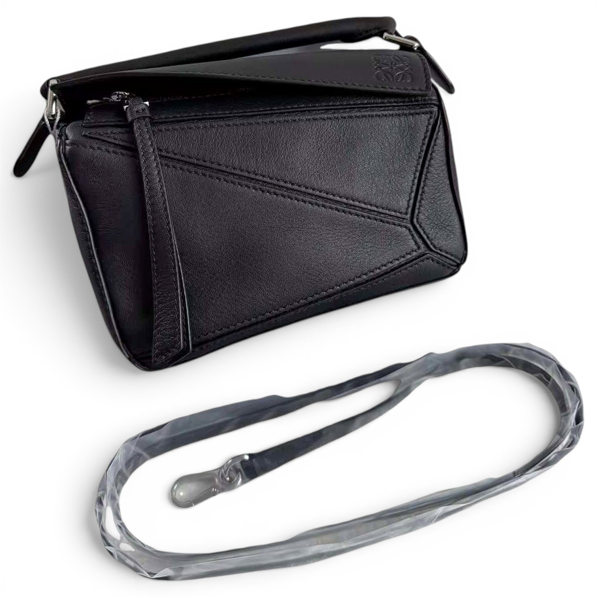 Puzzle leather handbag