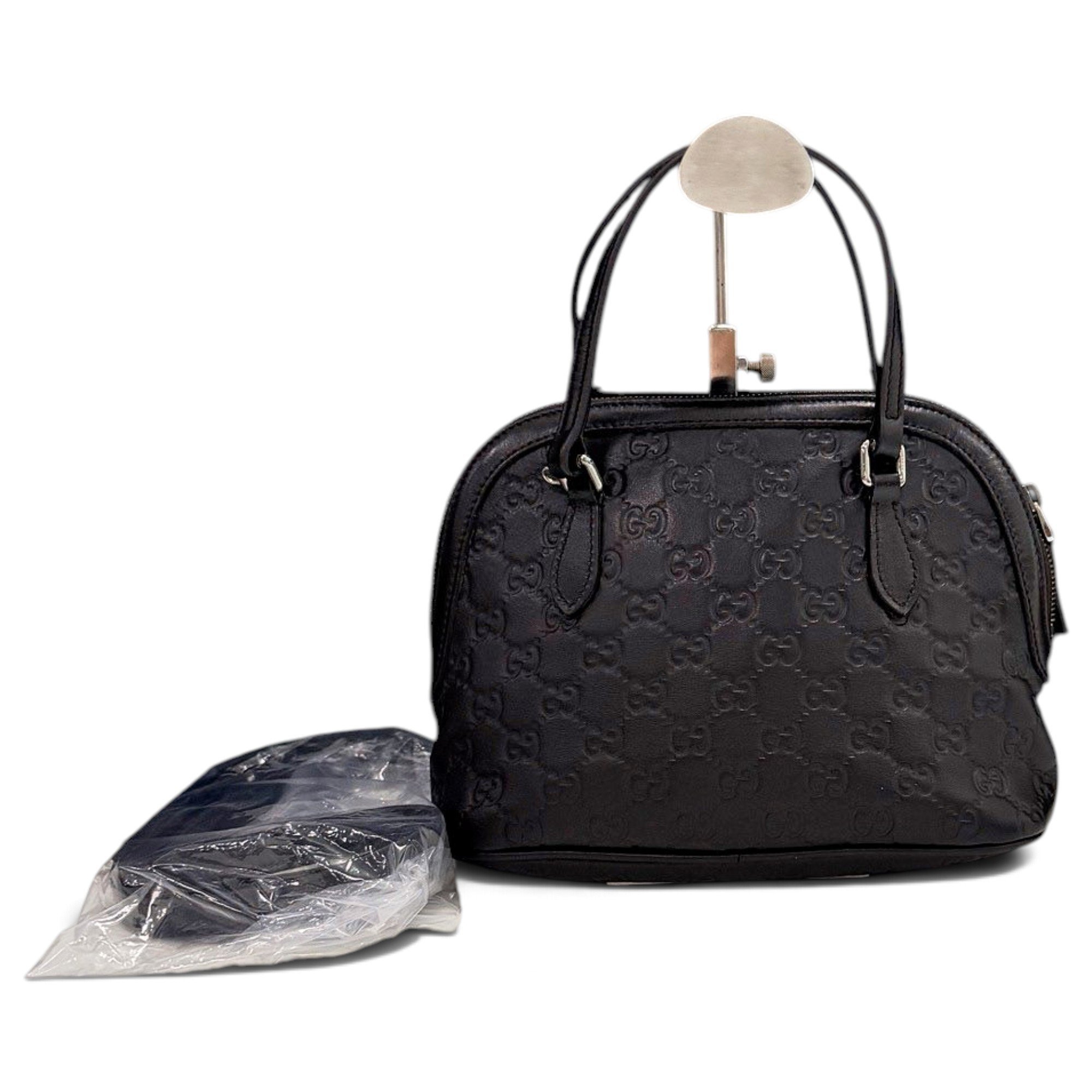 Dôme leather handbag