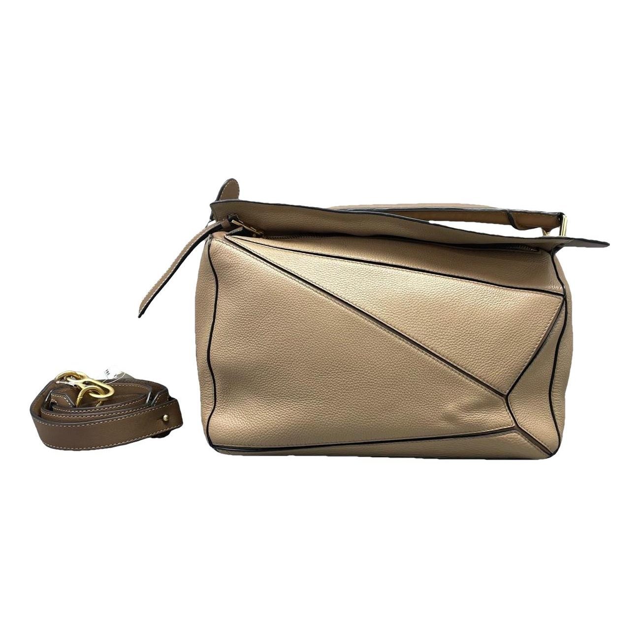 Puzzle leather crossbody bag