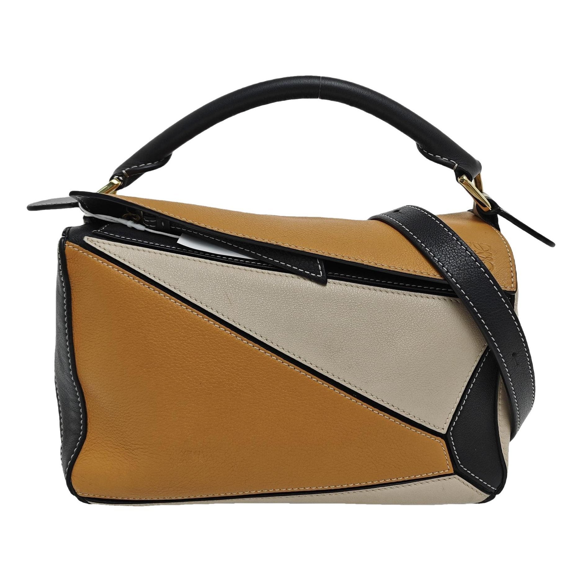 Puzzle leather crossbody bag