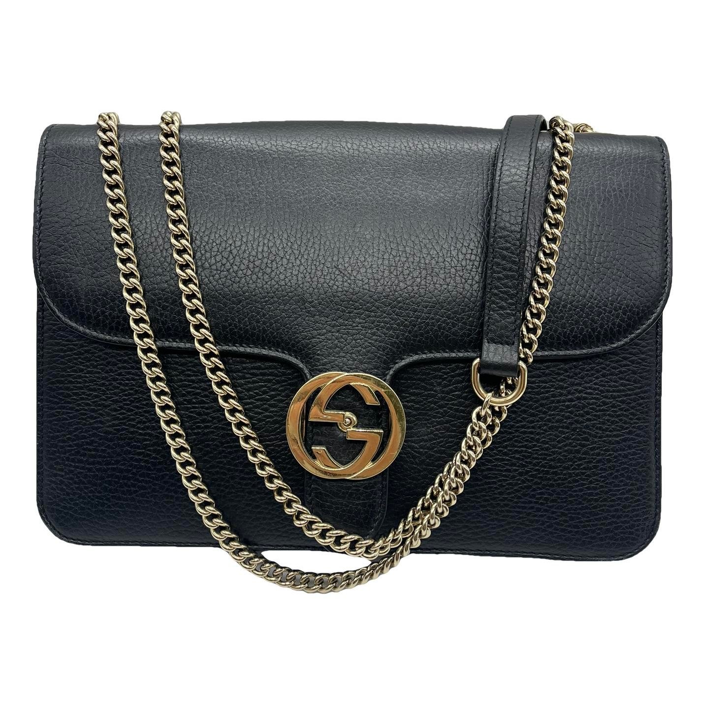 Interlocking leather clutch bag