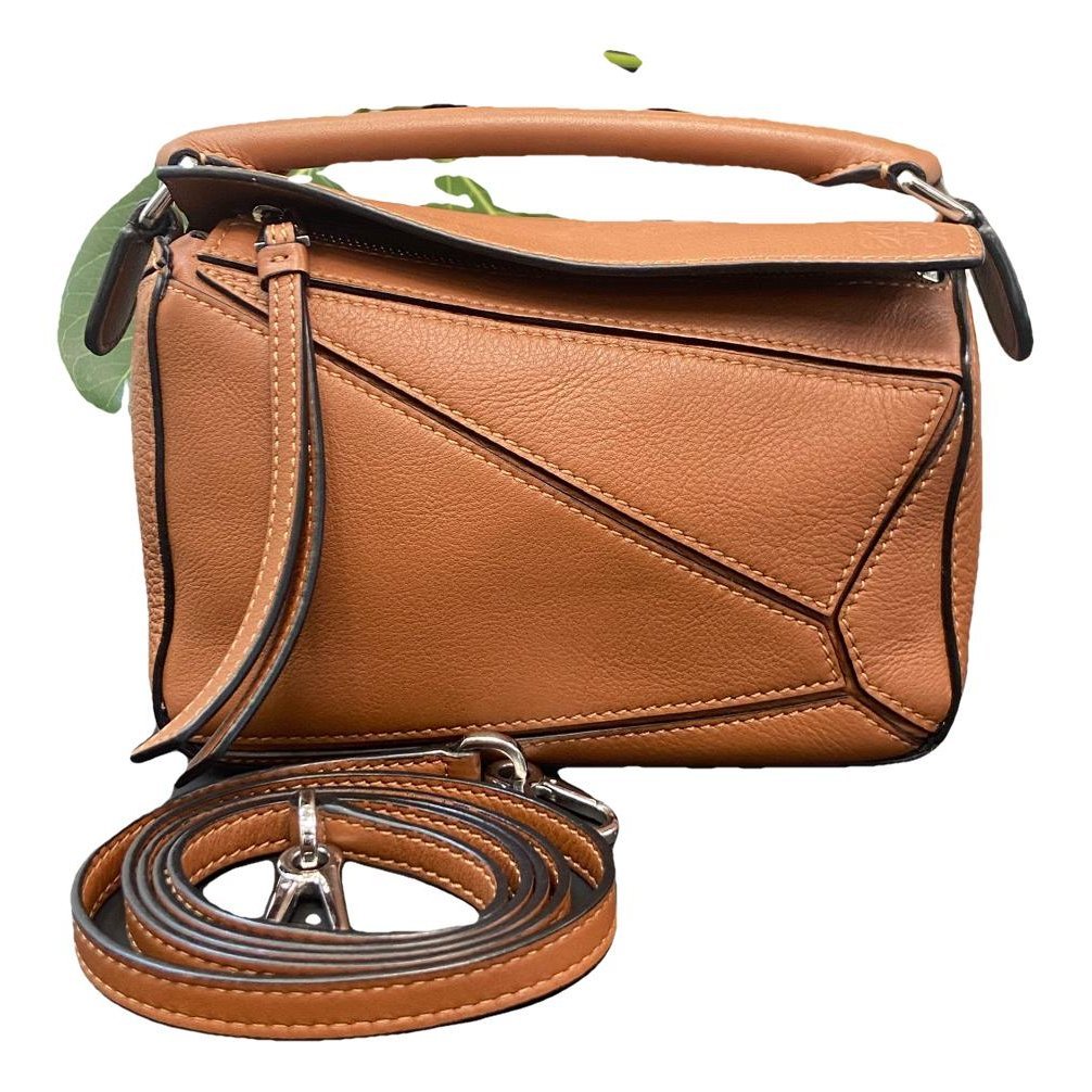 Puzzle leather handbag