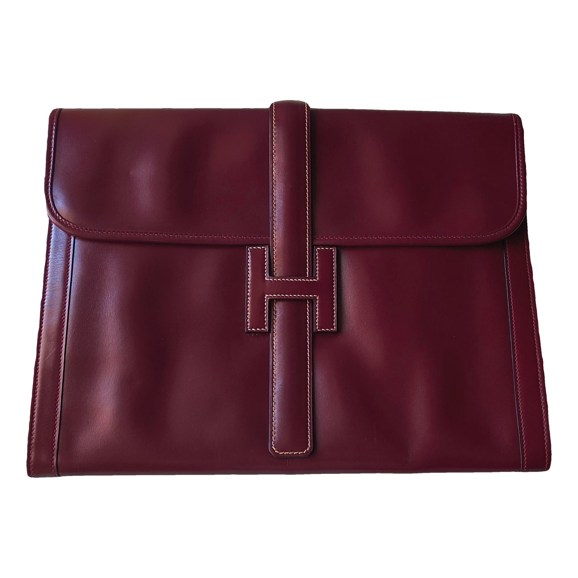 Jige leather clutch bag